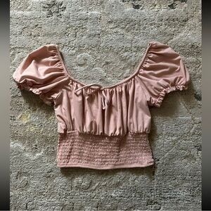 Pink cropped top with ruffled sleeves